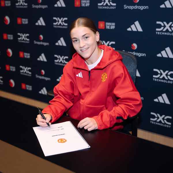 signing-and-smiling